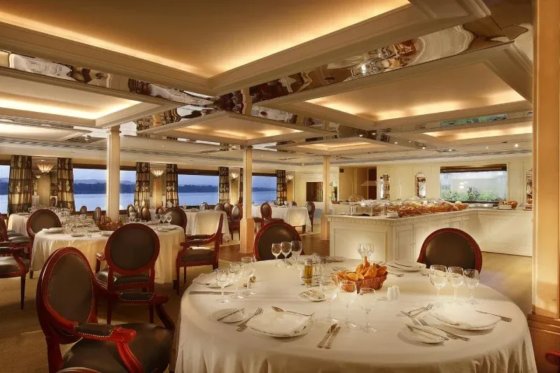 Sonesta Nile Goddess main dining room with à la carte dinner service, or lounge with belly dance and Nubian folkloric entertainment, Egypt 2026