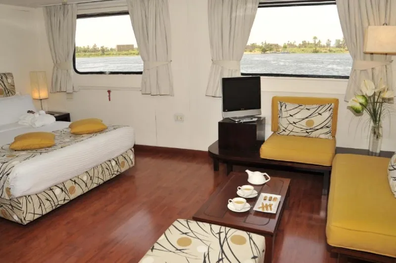 Alexander The Great Nile Cruise suite — full-size bathtub, teak floors, private bar, panoramic suite with balcony Egypt 2026