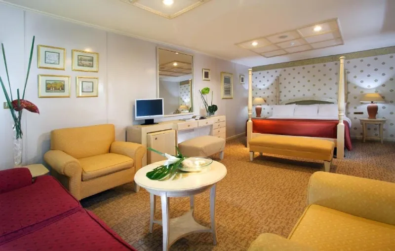Mövenpick MS Prince Abbas deluxe cabin with panoramic window overlooking Lake Nasser — standard cabins panoramic window not balcony, confirmed official Mövenpick site, Egypt 2026