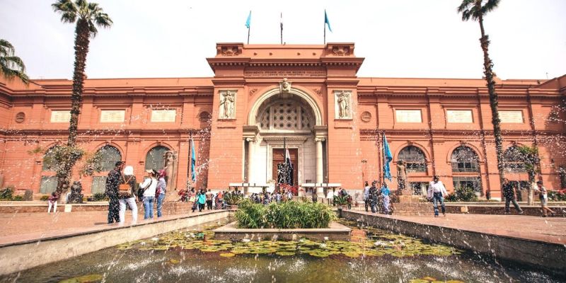Egyptian Museum Tahrir Square Cairo Egypt 2026 — neoclassical pink facade opened 1902 housing 170,000 ancient Egyptian artifacts