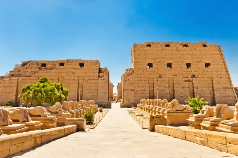 Karnak Temple Avenue of Ram-Headed Sphinxes entrance Luxor Egypt — processional route to the First Pylon