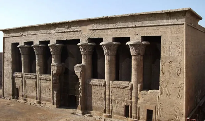 Esna Temple hypostyle hall Egypt 2026 — 18 columns with composite capitals and astronomical ceiling 9 metres below modern Esna street