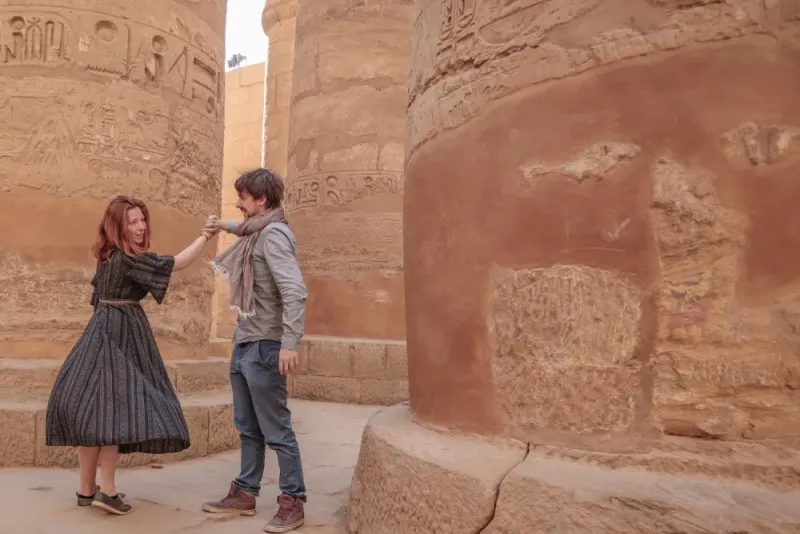 Egypt honeymoon couple on Dahabiya at sunset — romantic Nile cruise honeymoon package Best Nile Cruises 2026