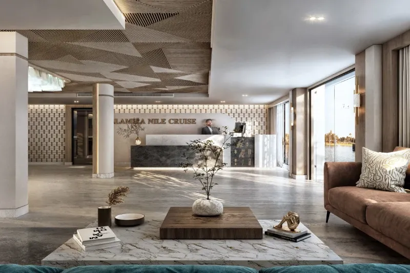 Royal Princess Nile Cruise lobby — polished marble floors, bronze finishes, contemporary classic boutique-hotel design Egypt 2026