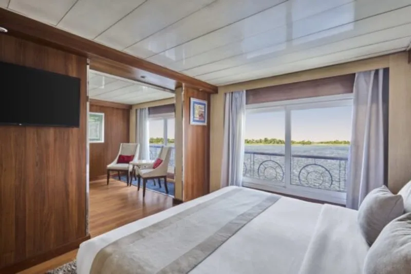 Blue Shadow IV Nile Cruise Royal Suite 33m² — individual AC, LCD TV, shower bathroom, mini bar and safe, budget 5-star Egypt 2026