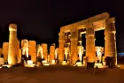 Karnak Temple Sound and Light Show Luxor Egypt night — illuminated pylons and columns reflected in Sacred Lake