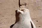 Temple of Edfu First Pylon 36 metres Egypt 2026 — tallest pylon in Egypt with two black granite Horus falcon statues at entrance