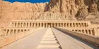 Temple of Hatshepsut Deir el-Bahri Luxor Egypt 2026 — three colonnaded terraces rising against the Theban limestone